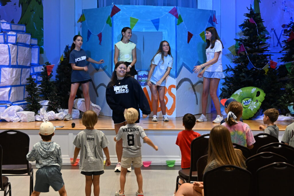 Children participating in music and motions during St Paul Vacation Bible School