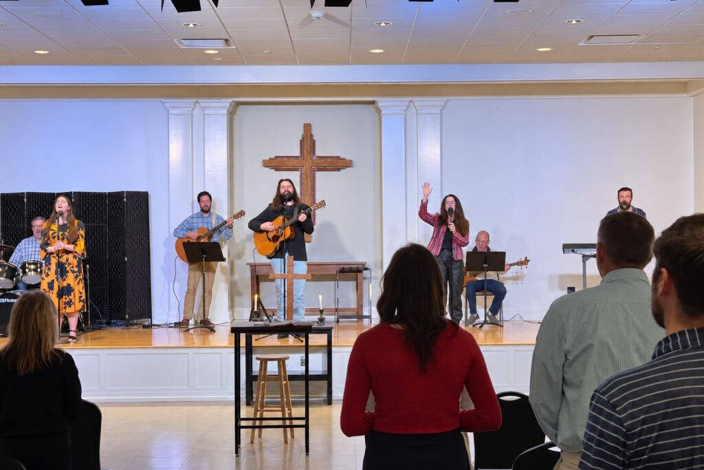 Congregation participating in modern worship